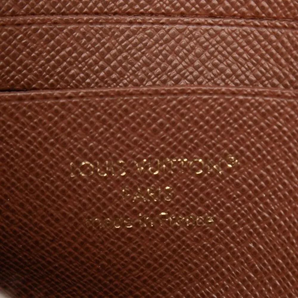 Louis Vuitton Portefeuille Noa Compact Coin Case